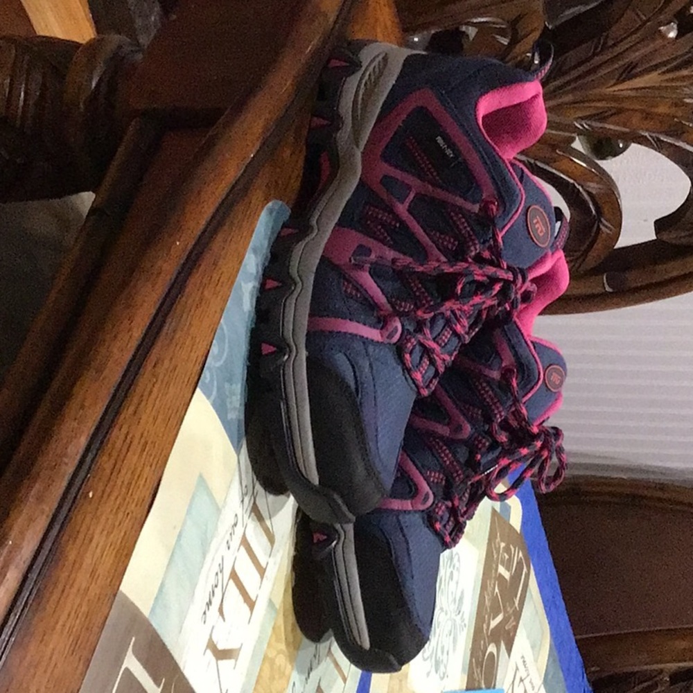 Women’s hiking shoes magenta and navy blue.